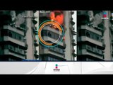 Se cuelga del edificio mientras se incendia | Noticias con Francisco Zea