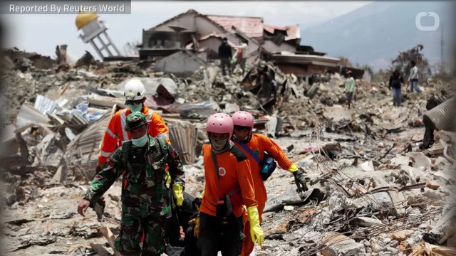 French Rescuers Search For Bodies In Debris of Indonesian Quake Disaster