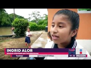 Estos niños y papás cruzan un río solo para llegar a la escuela | Noticias con Yuriria