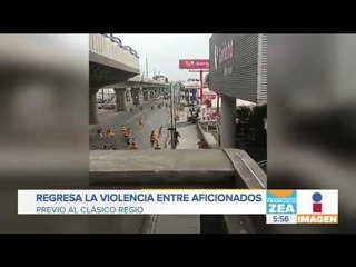 Download Video: Aficionados de Monterrey y Tigres se agarran a golpes en la calle | Noticias con Zea