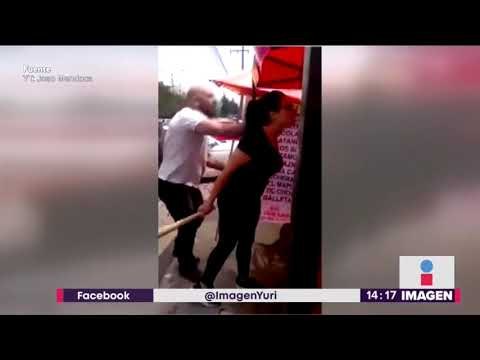 Liberan a la pareja que agarró a golpes a vendedor de nieves | Noticias con Yuriria Sierra