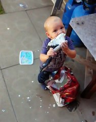 Mum finds little lad eating melted ice cream with a dustpan brush outside