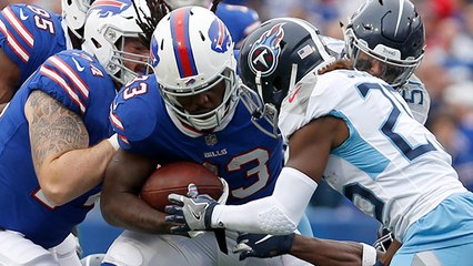 Ivory refuses to go down with defenders draped all over him