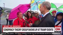 BREAKING NEWS CONSPIRACY THEORY GROUP SHOWS UP AT TRUMP EVENTS. CNN NEWS
