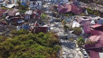 Aerial footage shows houses flattened, piles of debris littered on earthquake-stricken Indonesia island