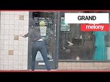 Woman caught smashing her way into shop using melon | SWNS TV