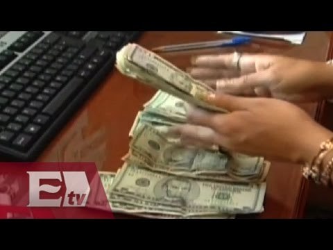 Enrique Peña Nieto firma decreto para eliminar el límite de uso de dólares / Paul Lara