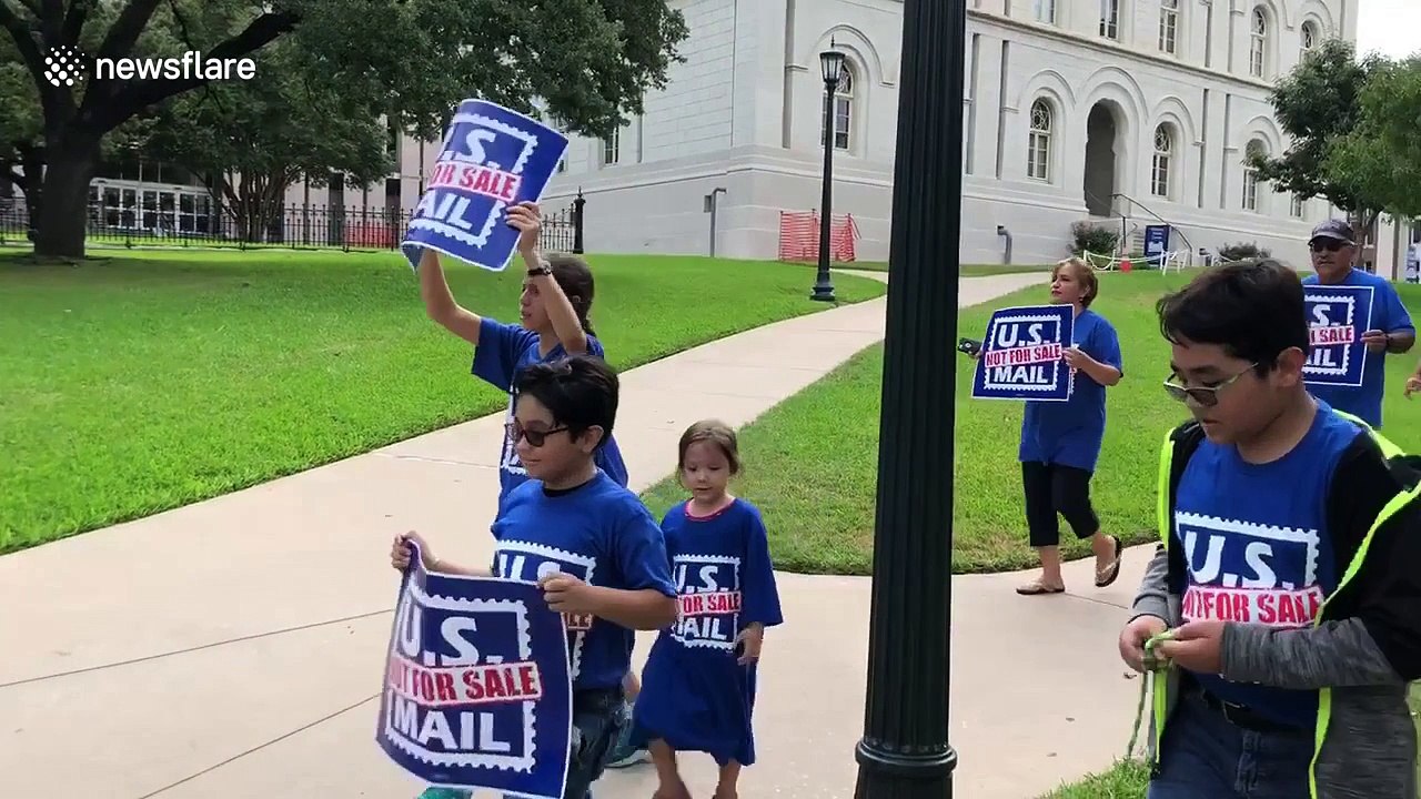 Protesters chant "US mail, not for sale" in rally against Trump's proposed privatization of postal services