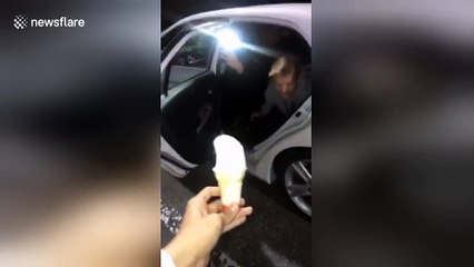 A high-stakes bottle flip? Man lands an ice cream flip!