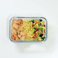 These tasty THAI PEANUT CHICKEN MEAL PREP BOWLS include a layer of  simple sesame noodles topped with quickly sautéed chicken, fresh and crunchy slaw, and easy