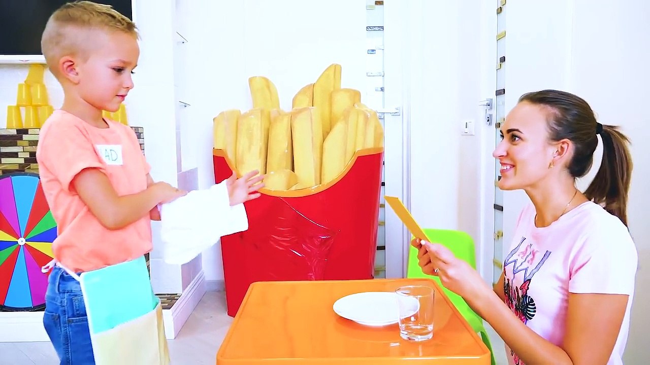 Vlad, Nikita and Mama playing in cafe