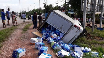 Woman's car flattened by out-of-control truck while waiting at junction