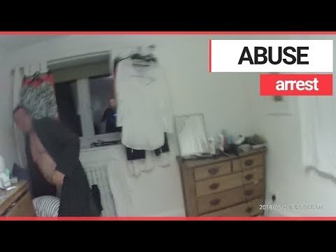 Police arrest man as he stands over his wife threatening to kill her | SWNS TV