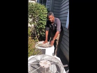 Home Inspector Inspects Air Conditioner System
