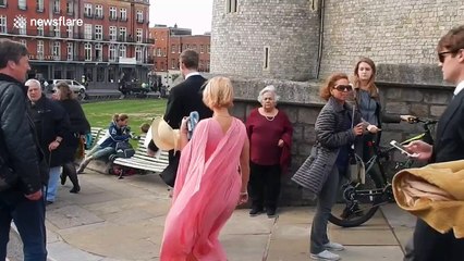 Pixie Geldof appears camera-shy as she departs royal wedding