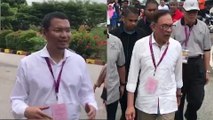 Saiful lurks at the same polling centre as Anwar