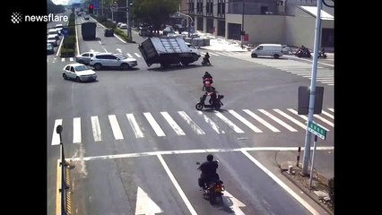 Motorcyclist narrowly misses death by inches as truck makes sharp swerve