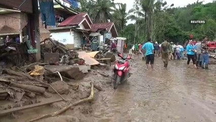 Indonesia flash foods, landslides kill at least 21, destroy hundreds of homes