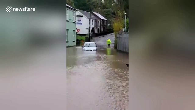 Man wades across flood because he doesn't want to extend morning run