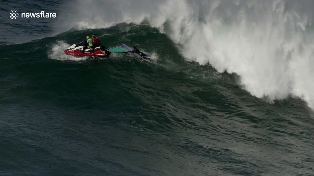 Surfers in Portugal ride season's first big swell hours before Storm Leslie makes landfall