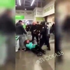 Russian fascist beats pregnant woman in the supermarket