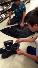 Pair of Boots Come with Free Family of Mice