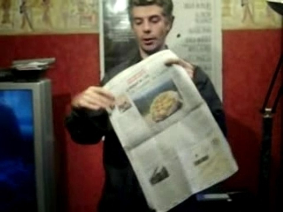 Journal déchiré reconstitué tour de magie