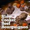 SLOW COOKER BEEF BOURGUIGNON has crazy tender melt in your mouth beef with veggies that slow cook in the most amazing rich sauce!PRINTABLE RECIPE HERE: