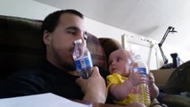 Baby's reaction to Dad mimicking her chewing a water bottle is probably the cutest thing you'll see today...