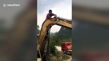 Man tries to fix broken digger with tape