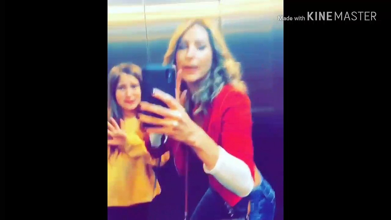 Geraldine Bazan bailando con sus hijas en un elevador