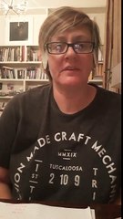 Woman flicks CD's over her eyes