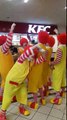 Group of Ronald McDonalds in KFC sing You're shit and you know you are