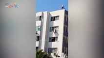 مستخلص جمركى يهدد بالانتحار من أعلى مبنى ببورسعيد