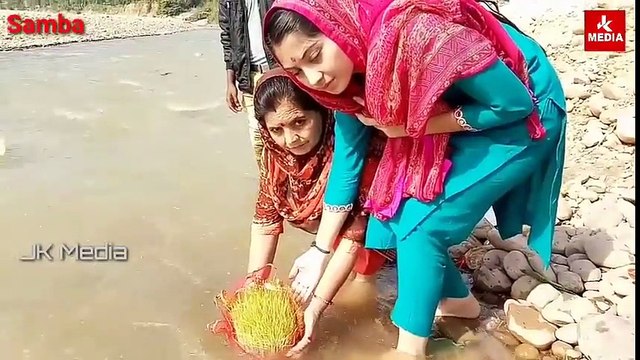 Devotees immersing ‘Saakh’ in Samba