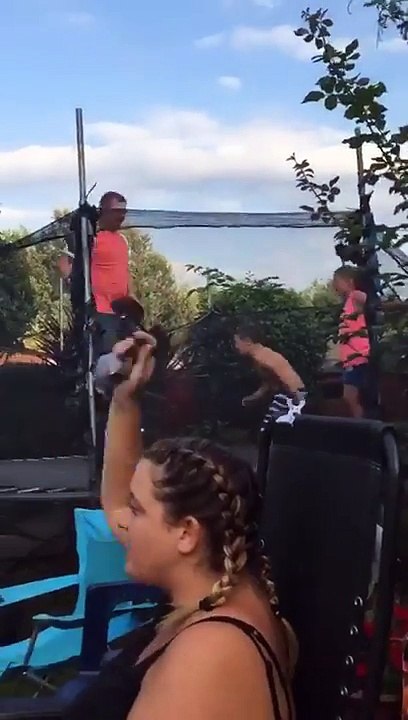 does a back flip and breaks through the trampoline