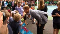 Miles reciben a príncipe Enrique y Meghan Markle en Melbourne