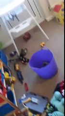 Little lad hides in the corner after painting himself blue