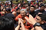 Zahid accepts charges as a test from God