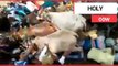 Villagers trampled on by hundreds of cows to bring them 'good luck' | SWNS TV