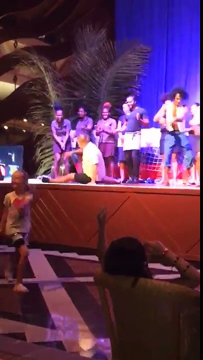 dances on stage with the holiday entertainment