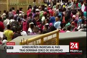 México: hondureños ingresan al país tras derribar cerco de seguridad