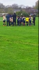 Kids show their respect during football match and hold a minutes silence