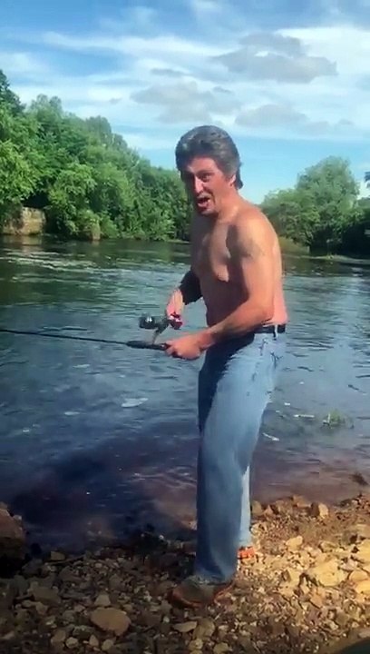 Guy showing off by a river then sharts himself