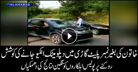 Woman threatens policemen after driving car without number plate in Diplomatic Enclave