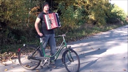 This is great! its a bike and a man playing an instruement......at the same time!!