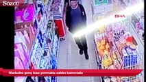 Markette genç kıza yumruklu saldırı kamerada