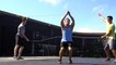 guy does the splits while jumping rope