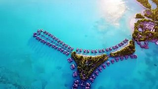 Flying over the St. Regis in Bora Bora via  incaidgalleries