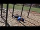 Guy Faceplants to Ground While Backflipping off Pull-Up Bar